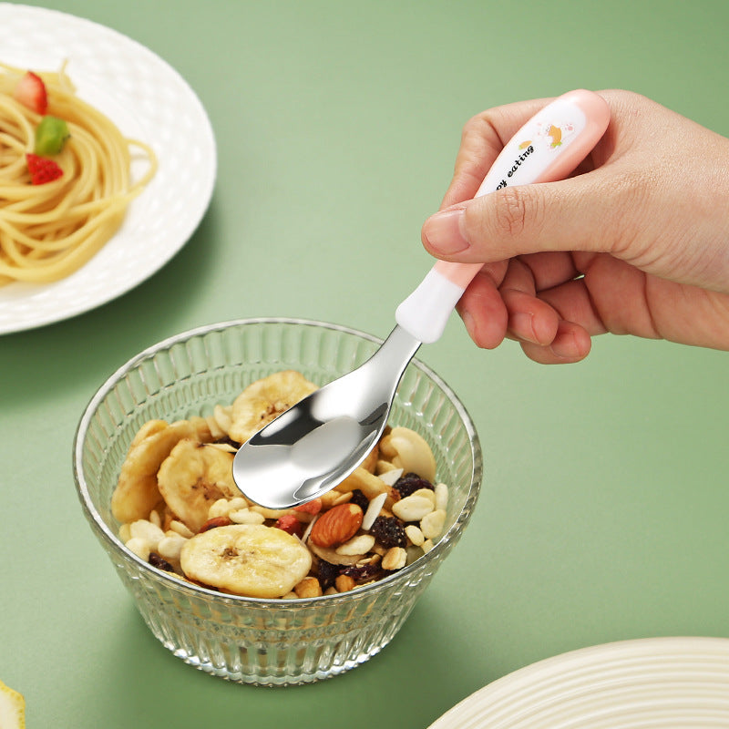 A Stainless Steel Spoon Designed for Dining, a Spoon for Feeding, And a Cartoon-Themed Rice Spoon
